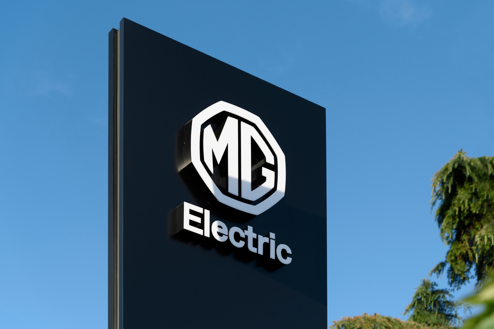 MG Signage with blue sky